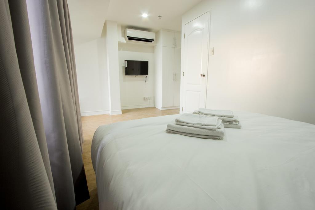 Oasis Regency @ Fort Victoria Bgc Тагуиг Екстериор снимка