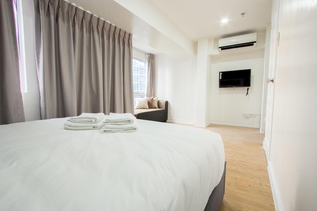 Oasis Regency @ Fort Victoria Bgc Тагуиг Екстериор снимка